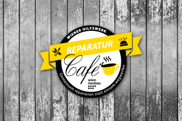 Kaffeetasse mit Schraubenschlüssel und Logo 